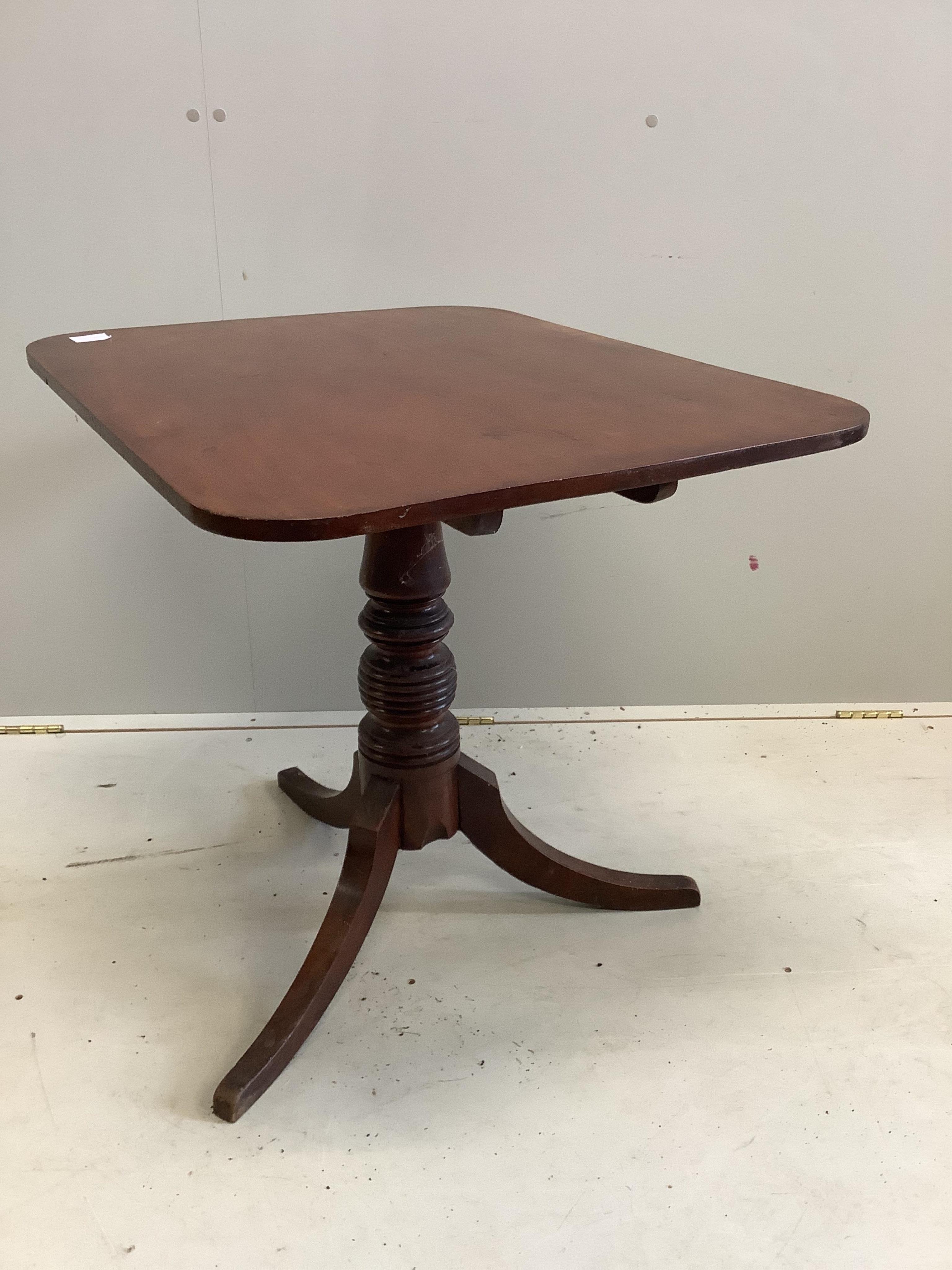 A Victorian rectangular mahogany tilt top tripod tea table, width 76cm, depth 61cm, height 67cm. Condition - fair